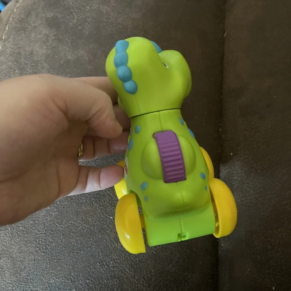 Fisher Price Green Dinosaur Rolling Clicker Pal Toy Amazing Animals Sensory 2017